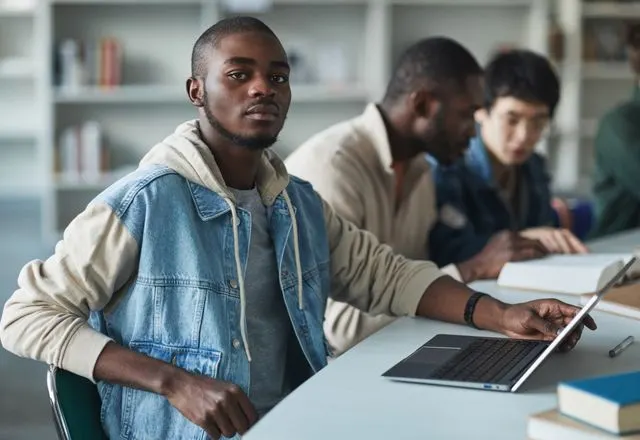 Students studying on laptops