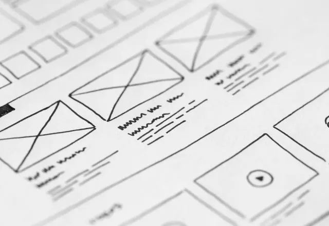 Hand-drawn website wireframes